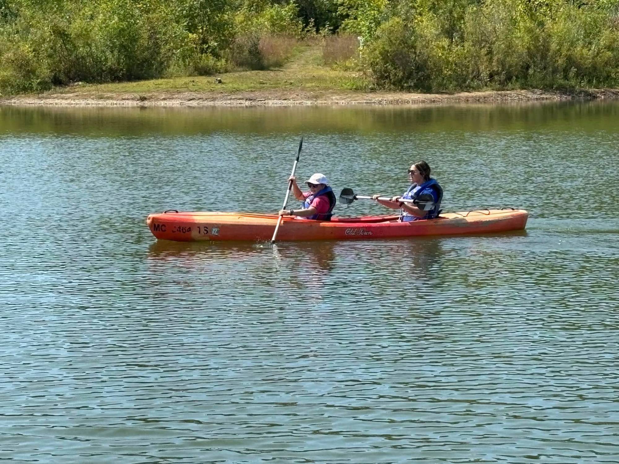 two students in kayak